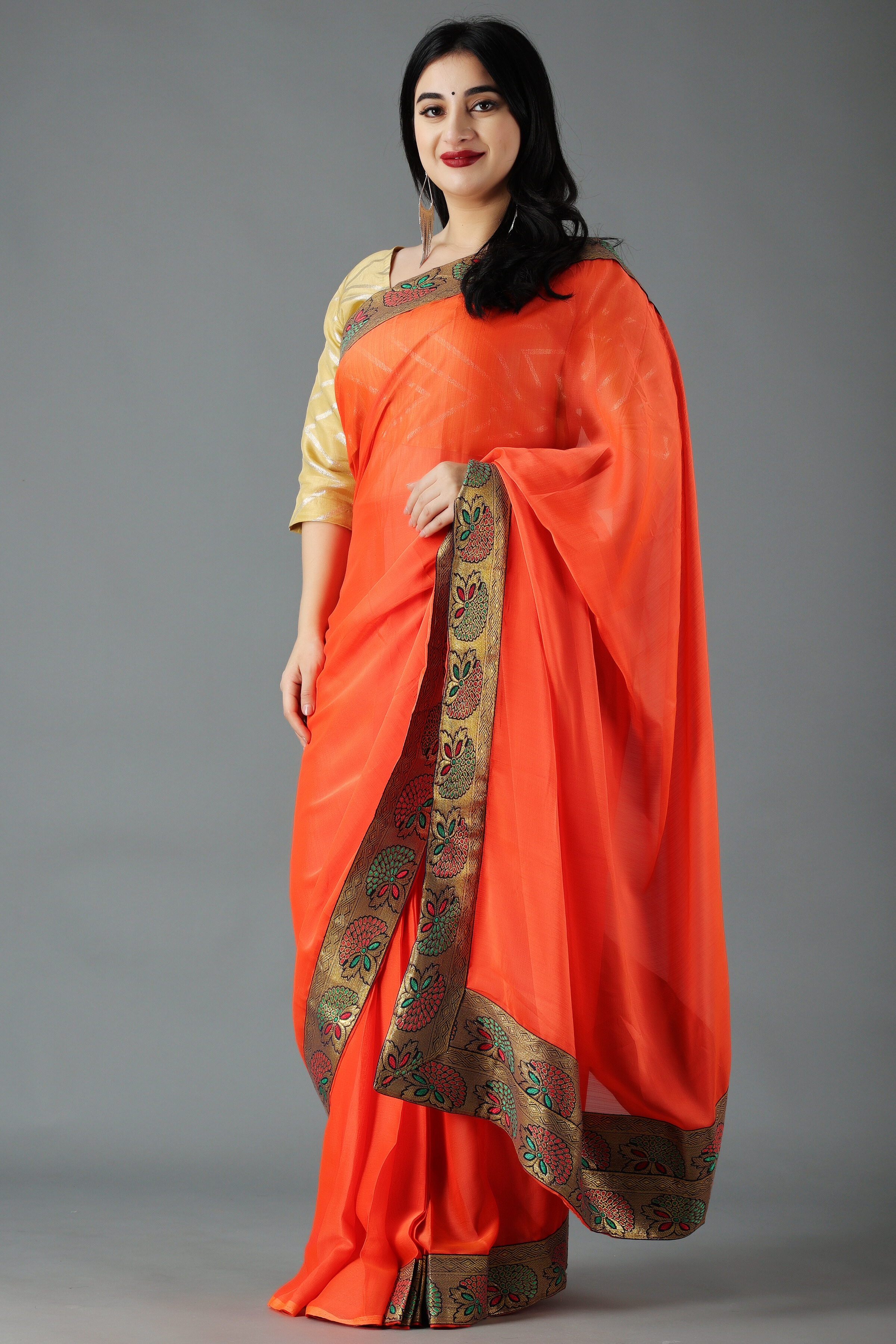 Which colour blouse will suit a dark golden saree? - Quora