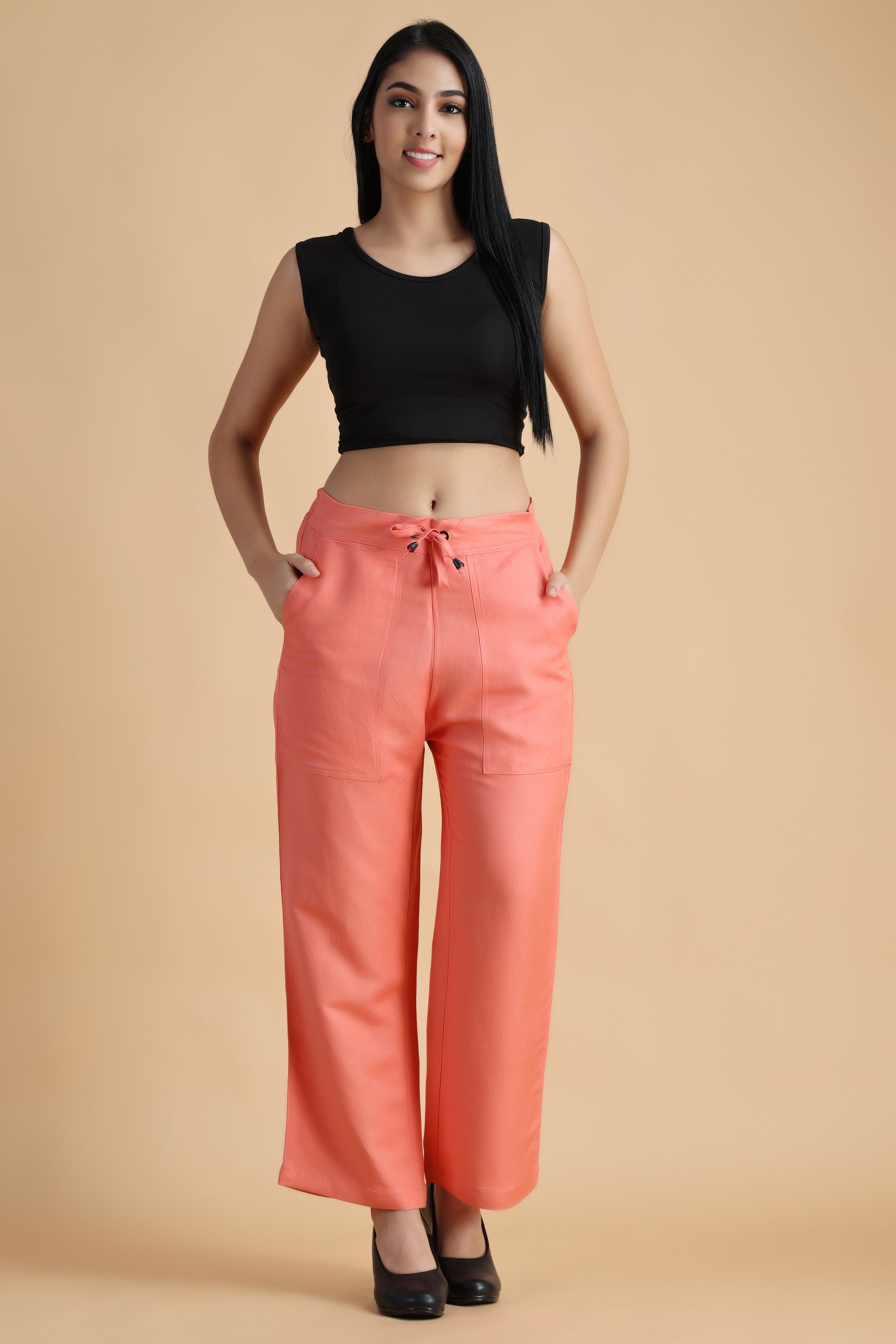 Peach Pleated Palazzo Pants Design by First Resort by Ramola Bachchan at  Pernias Pop Up Shop 2023