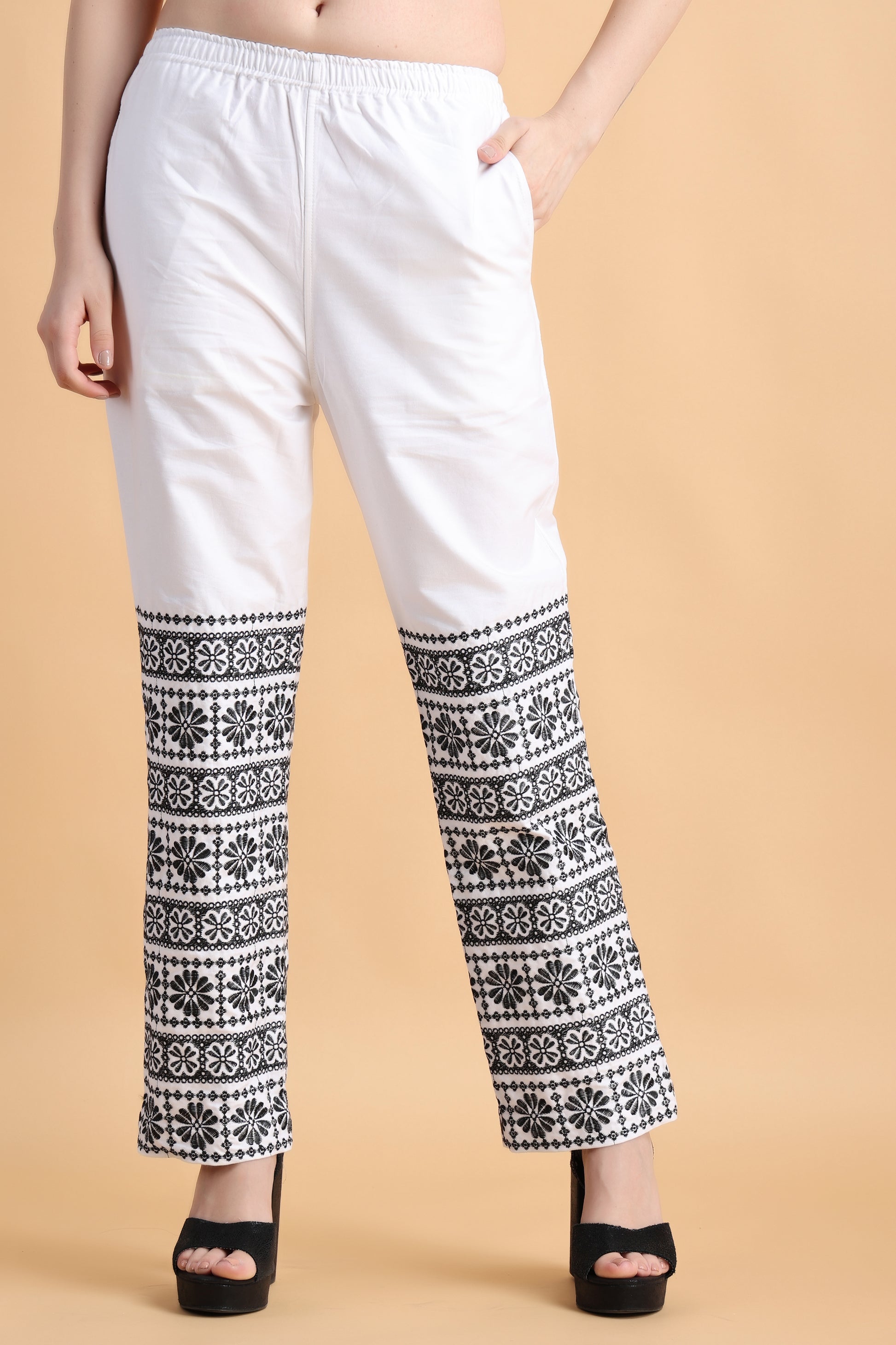 Buy online White Legging With Embroidery At Bottom from Capris